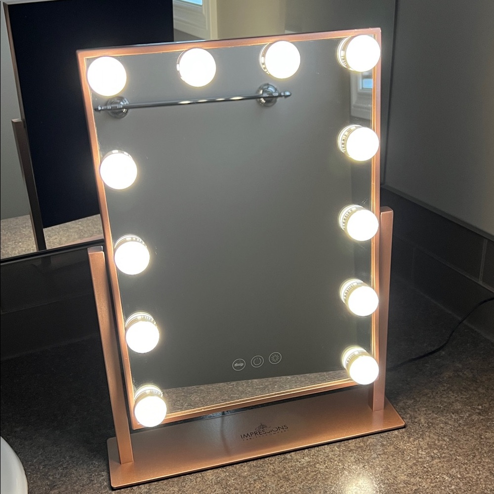 Impressions vanity mirror